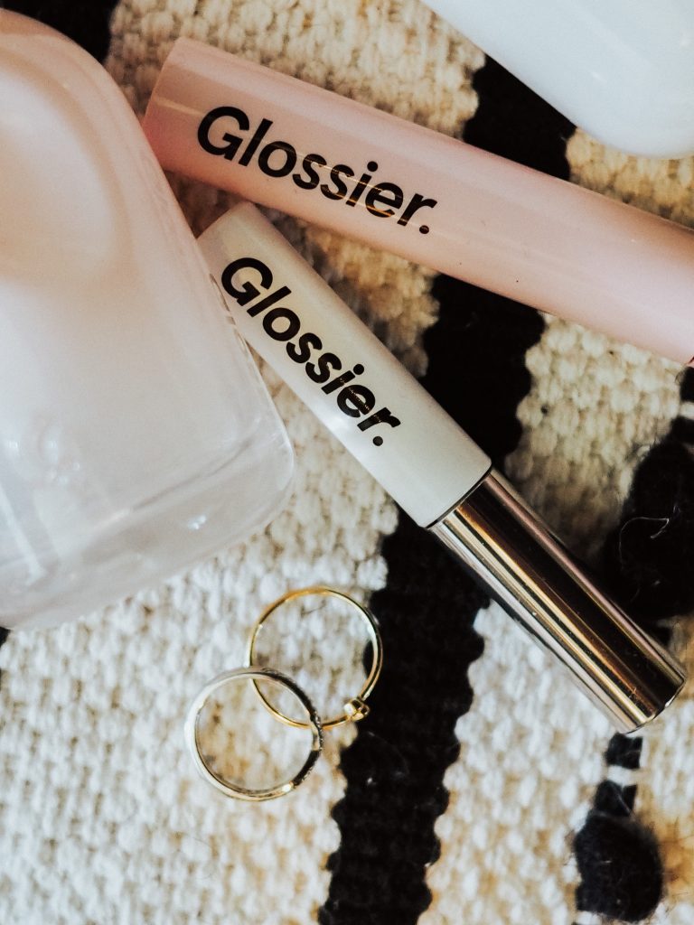 Kelsey from Blondes & Bagels dishes out her favorite Glossier products in this Glossier review of the best Glossier products!